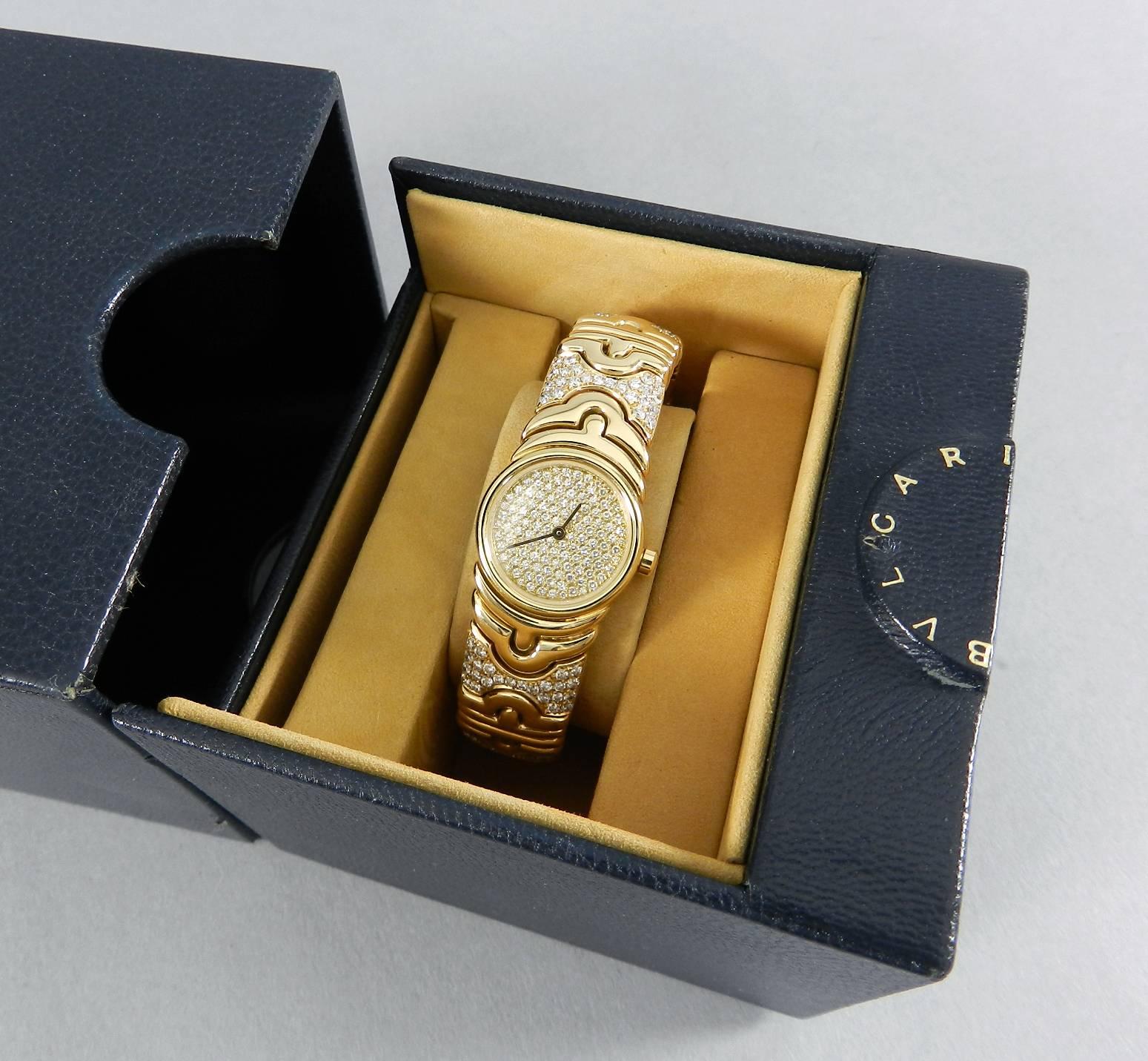 Bulgari Ladies Yellow Gold Diamond Parenthesis Quartz Bangle Wristwatch, c1993 In New Condition In Toronto, Ontario