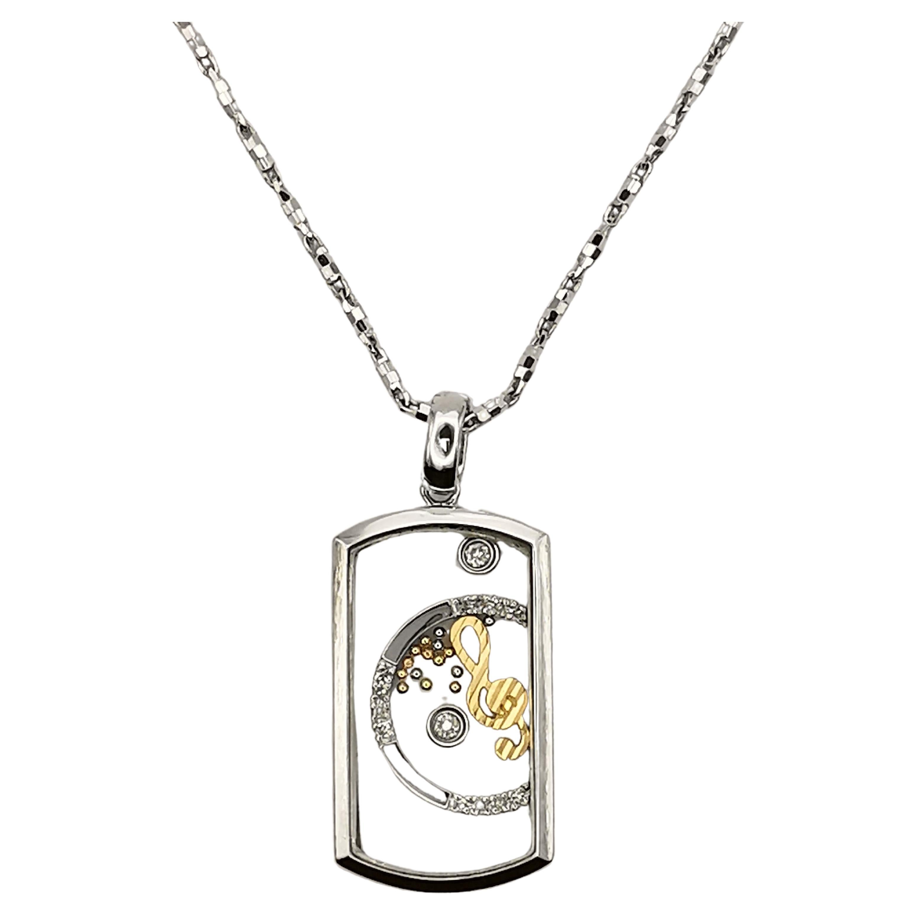 Happy Diamonds Pendentif collier note musicale en or blanc et jaune 18 carats