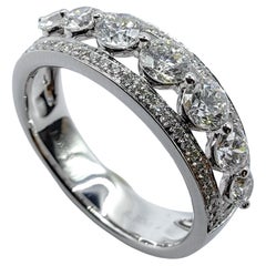 7 Round Brilliant Cut Diamonds & Pavé Diamond Channel Ring in 18K White Gold