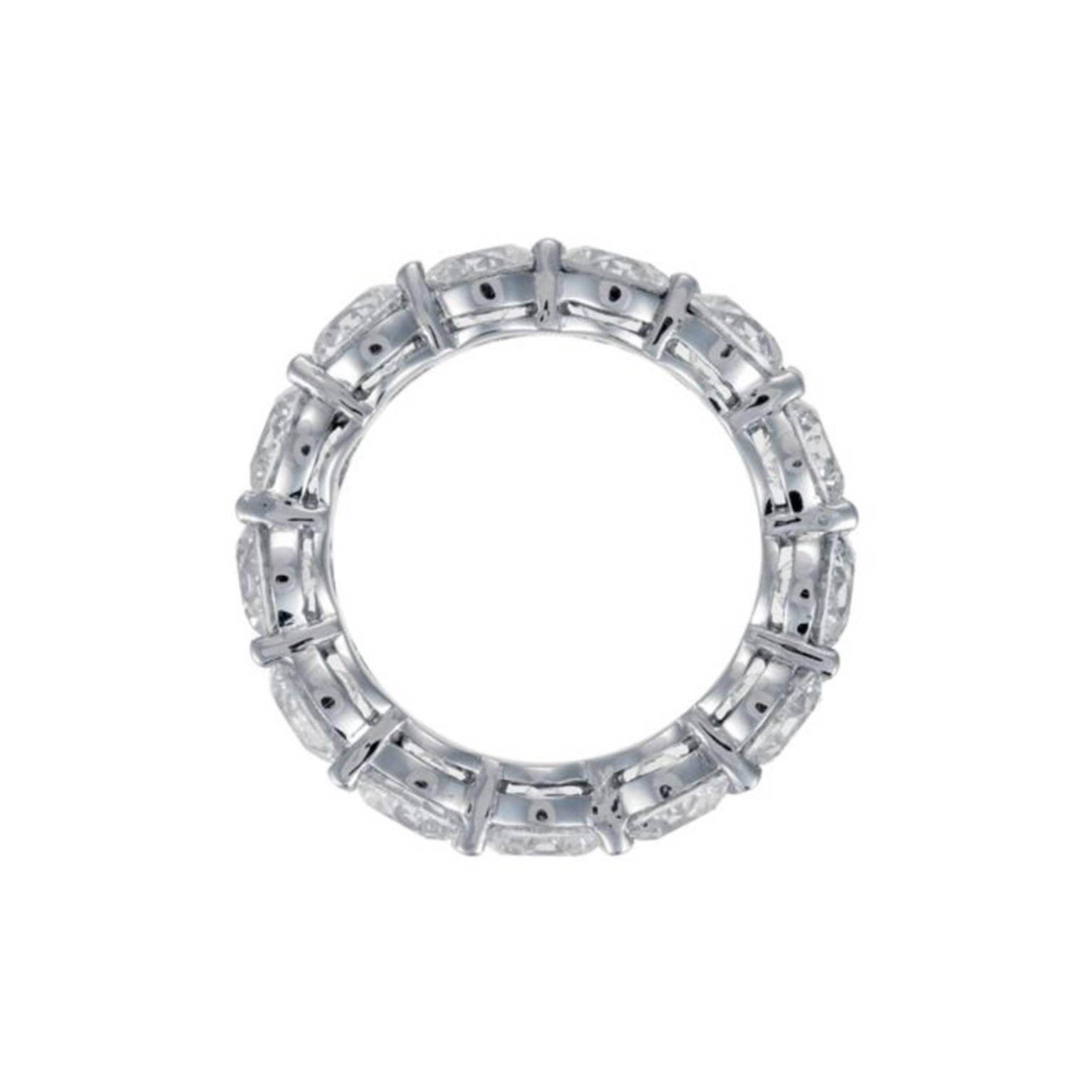 Beautiful Platinum All-The-Way Eternity Wedding Band features 9.30 Carat of 13 Round Cut Diamonds. The ring is available in 6 size, but could be resized upon your request.