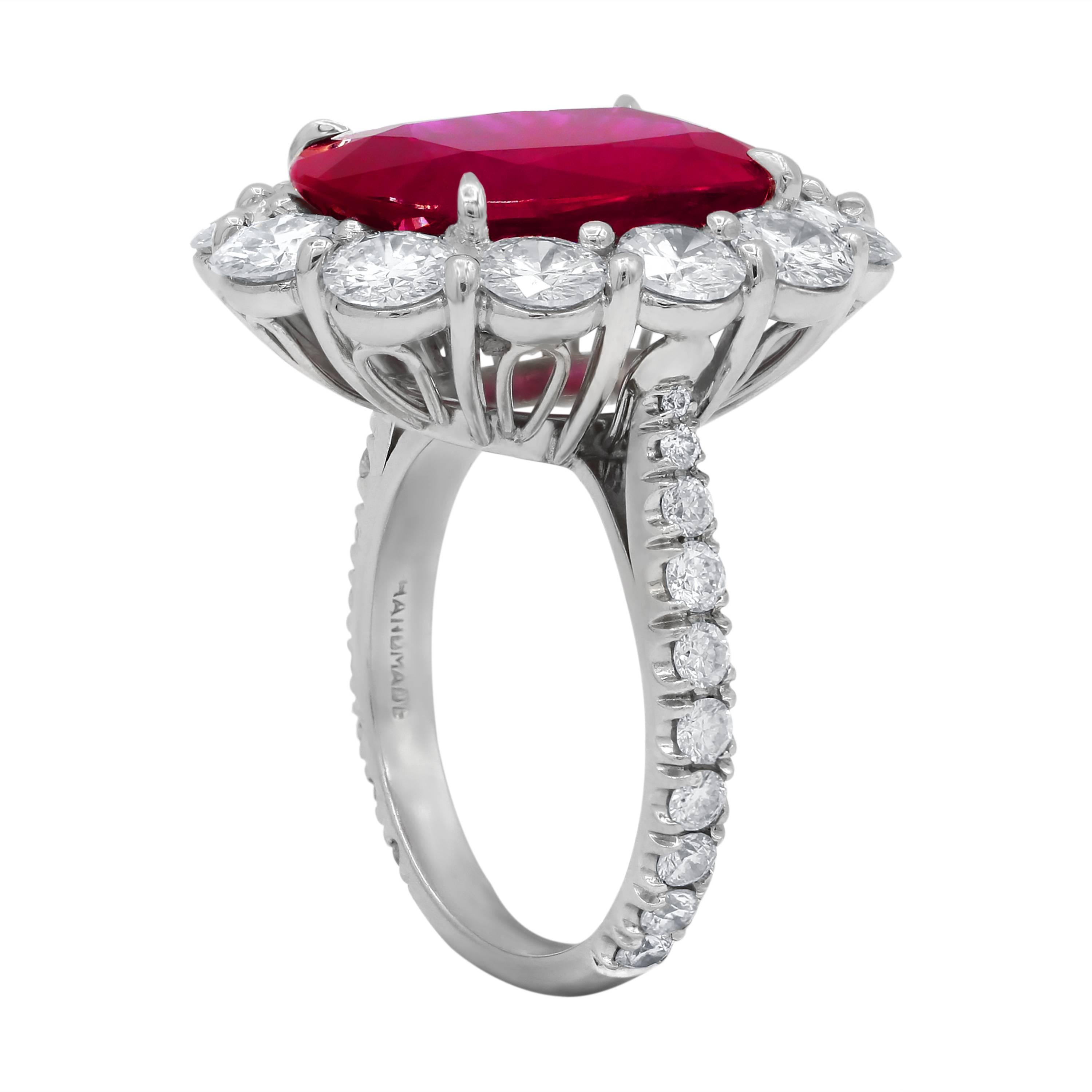 Platinum Natural Ruby and Diamond Ring, features 8.50 Carats oval shaped Ruby in the center certified by GSR Gemological Laboratory, certificate attached and surrounded by 3.50 Carats of round diamonds. in Princess Diana style setting