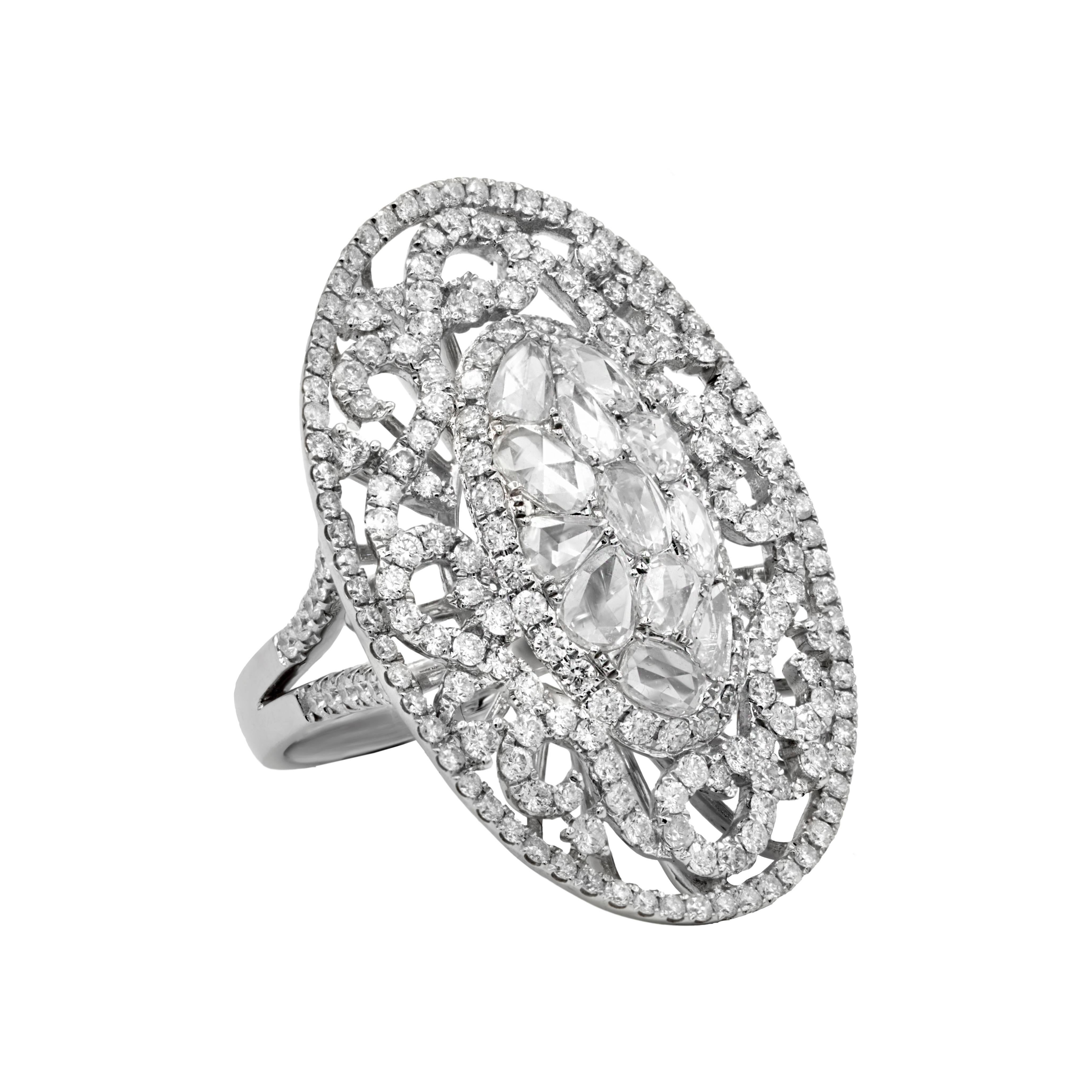 Ornamented ring features 6.00 carats of diamonds set in 18K white gold.