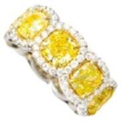 Diana M.18 kt white and yellow gold ring featuring 10.94 cts tw of radiant 