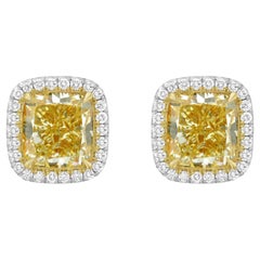 Diana M. 18KT Platinum Diamond studs, features 4.00 + 4.02ct  FY-VS1 GIA