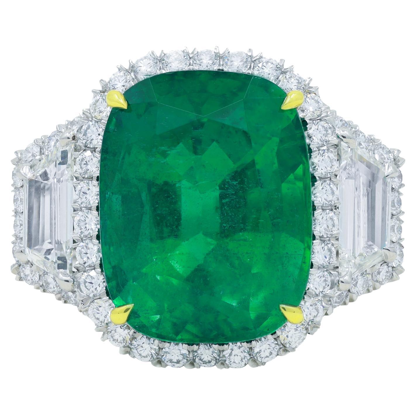 Diana M. Platinum and 18 kt yellow gold emerald and diamond ring featuring 11.22 For Sale