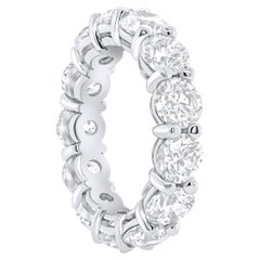 Diana M. 18kt white gold all the way around diamond eternity band feature 4.55ct