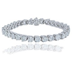 Diana M. 18kt white gold tennis bracelet with 7.85 cts tw of round diamonds 