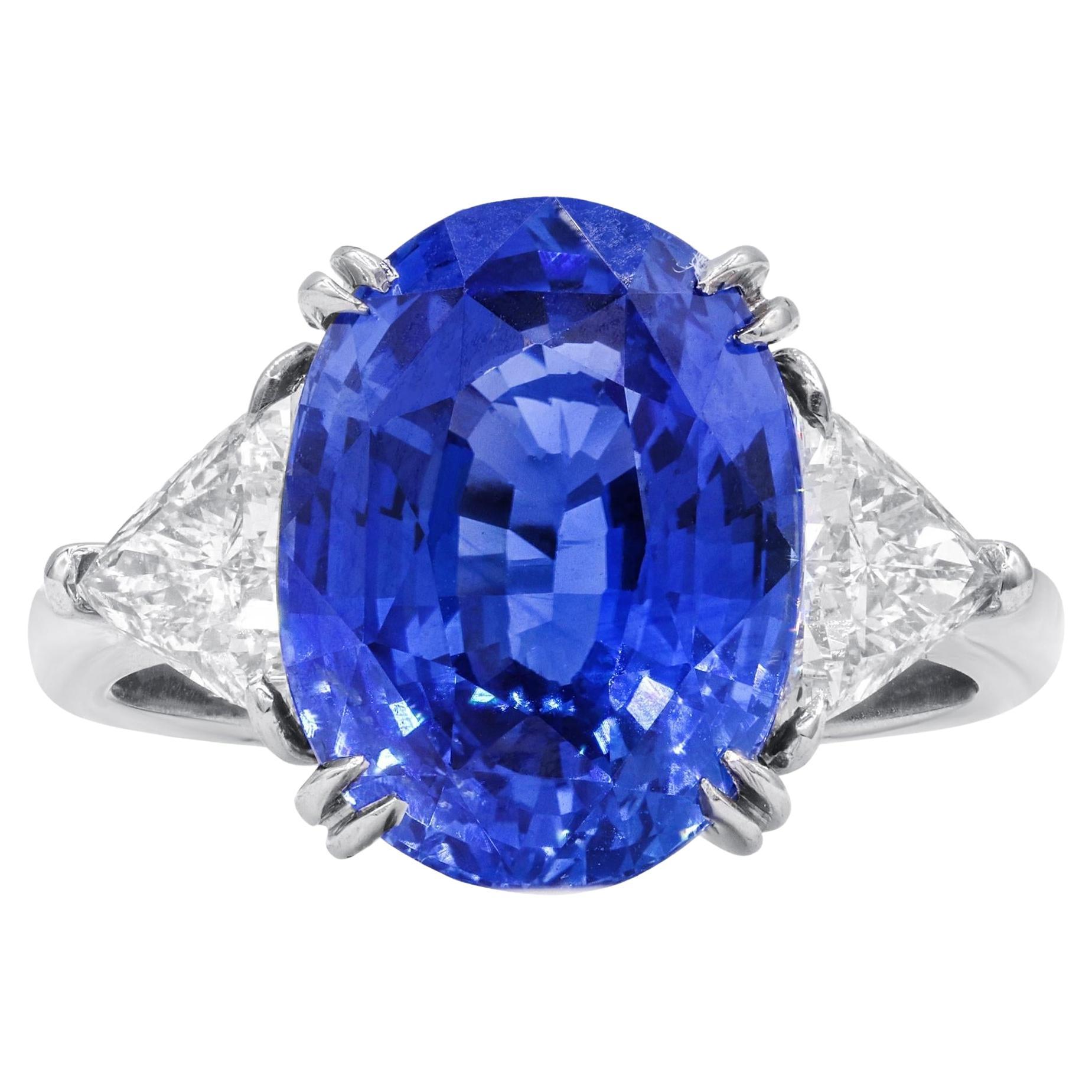 Diana M. Platinum ring featuring an 8.51 ct Ceylon sapphire with 2 trillants