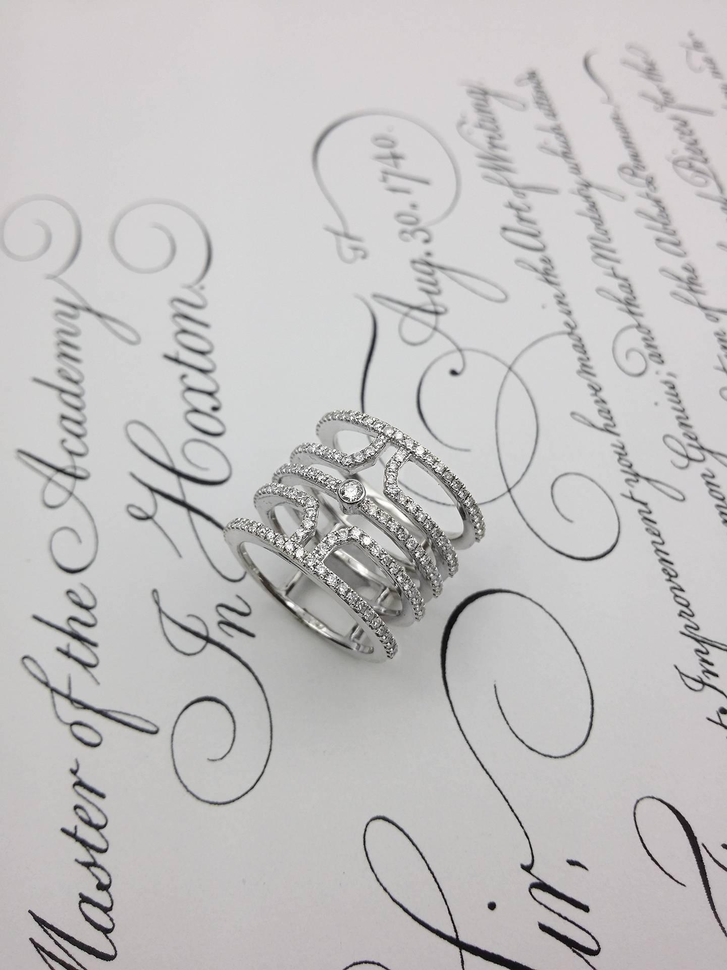 Multi row diamond fashion ring, features 1.00 carat of colorless white diamonds. 
The ring size is 6