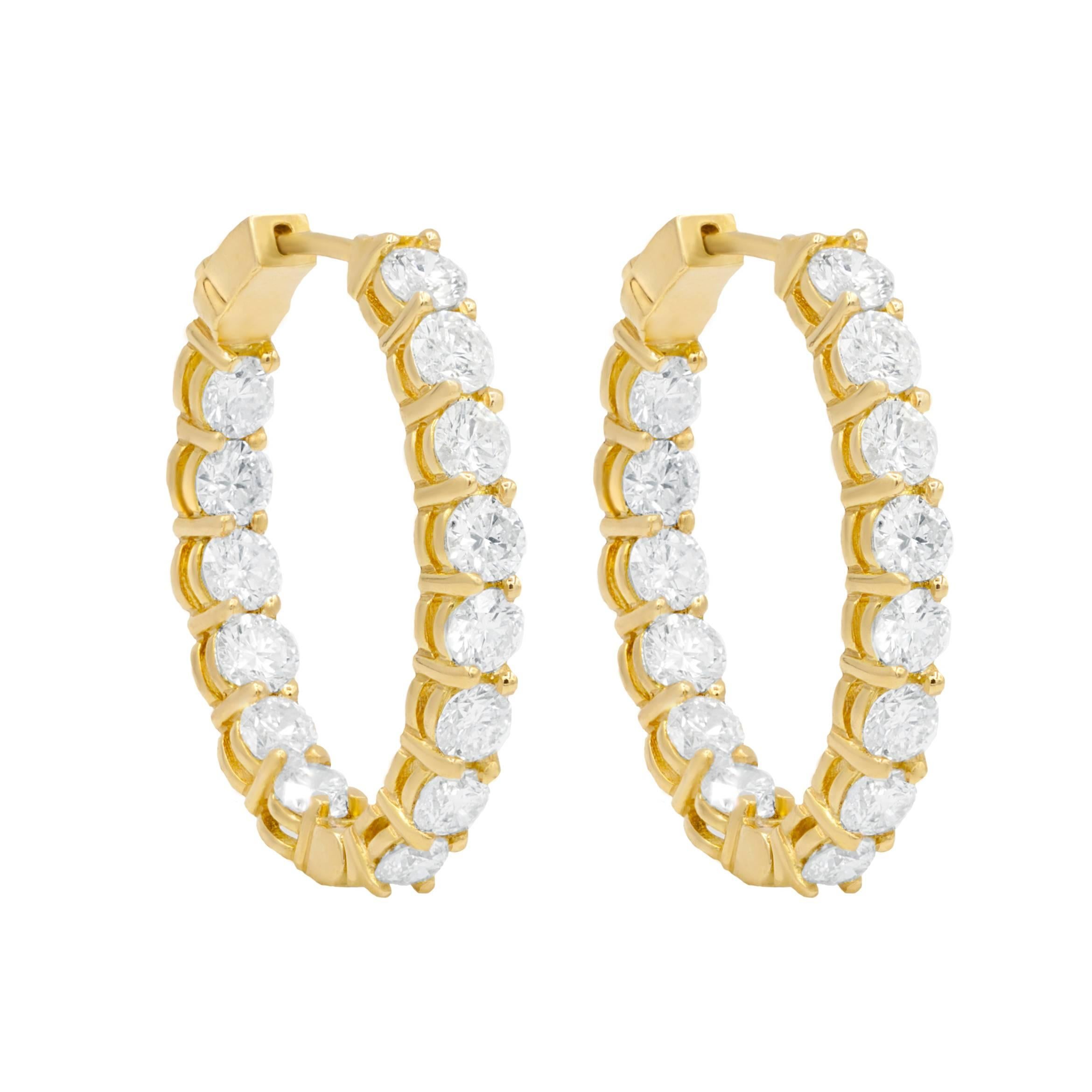 Absolutely stunning yellow gold diamond hoop earrings, features 6.60 carats of diamonds, each stone is approximately 0.25 carats. Total amount of round brilliant cut diamonds is (26 stones).  
The average color and clarity F-G SI 
Diameter: 1 1/2