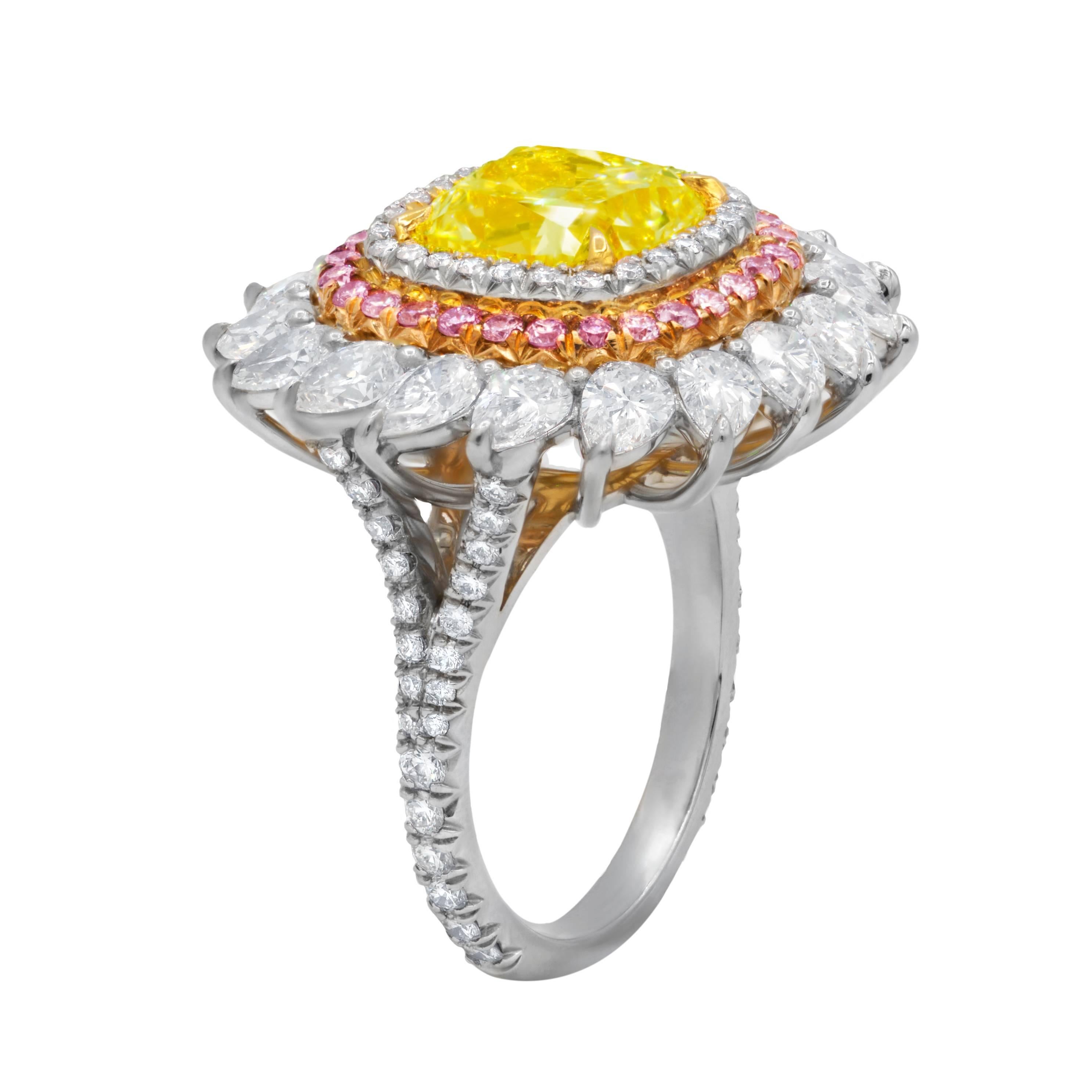 Platinum Yellow Diamond Ring, features 4.03 Carats Fancy Light Yellow Certified Cushion Cut diamond in the center, VS1 in Clarity, surrounded by triple row of multi shaped diamonds totaling 3.75 Carats of White Diamonds F-G in Color VS1-VS2 in