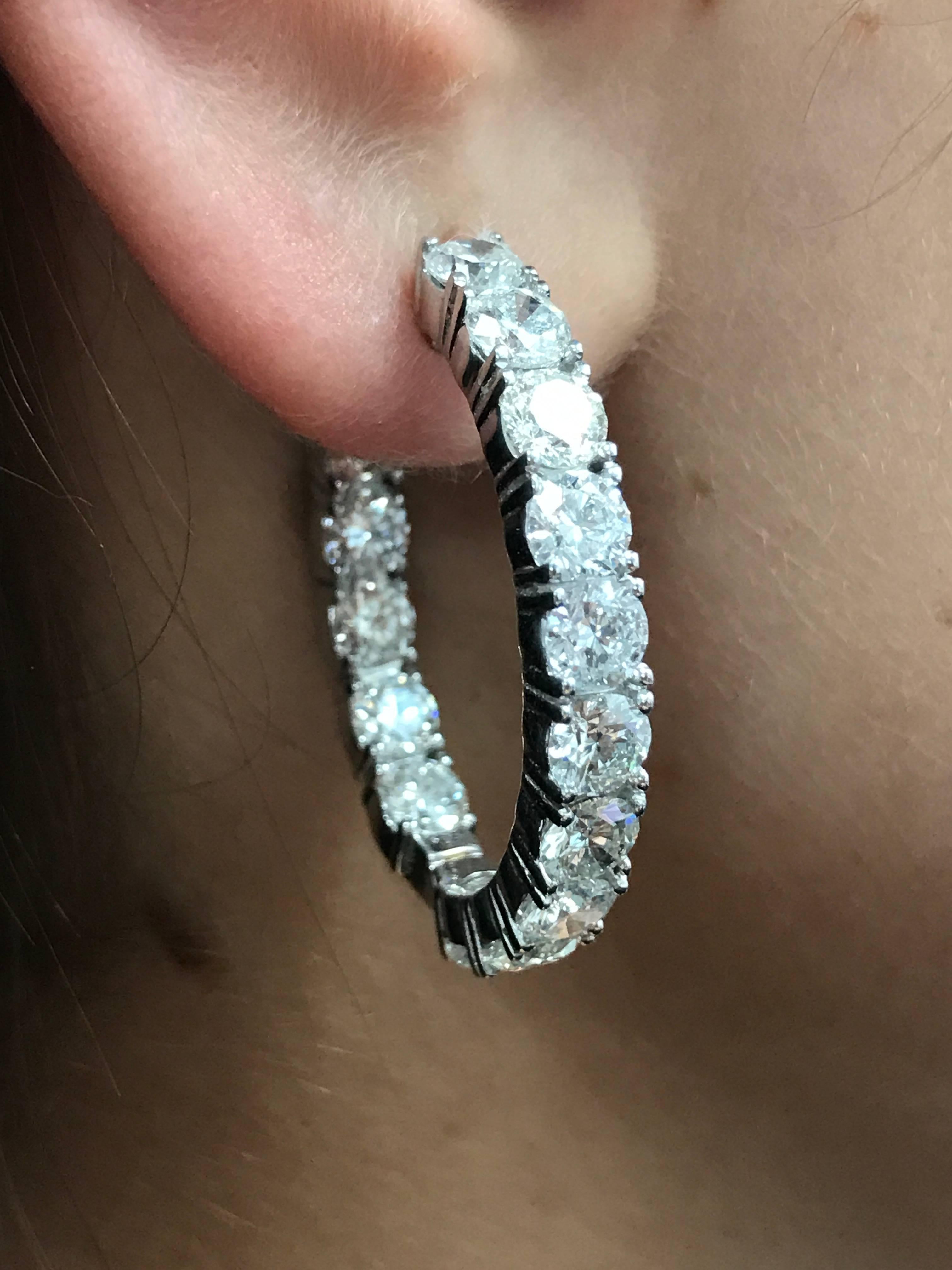 Rare and HOT diamond Oval Shaped diamond hoop Earrings, created by Diana M. Jewels. 
Features 10.00 Carats of diamonds, each stone approx. 0.31 Carats, round brilliant cut!
1