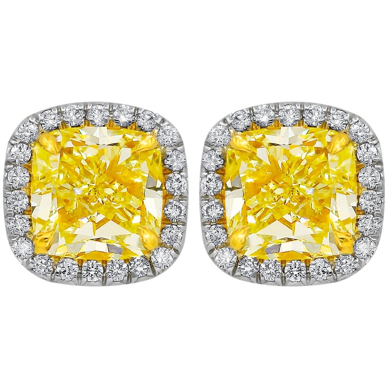 GIA Certified 2.10 Carat Fancy Yellow Diamond Stud Earrings For Sale at