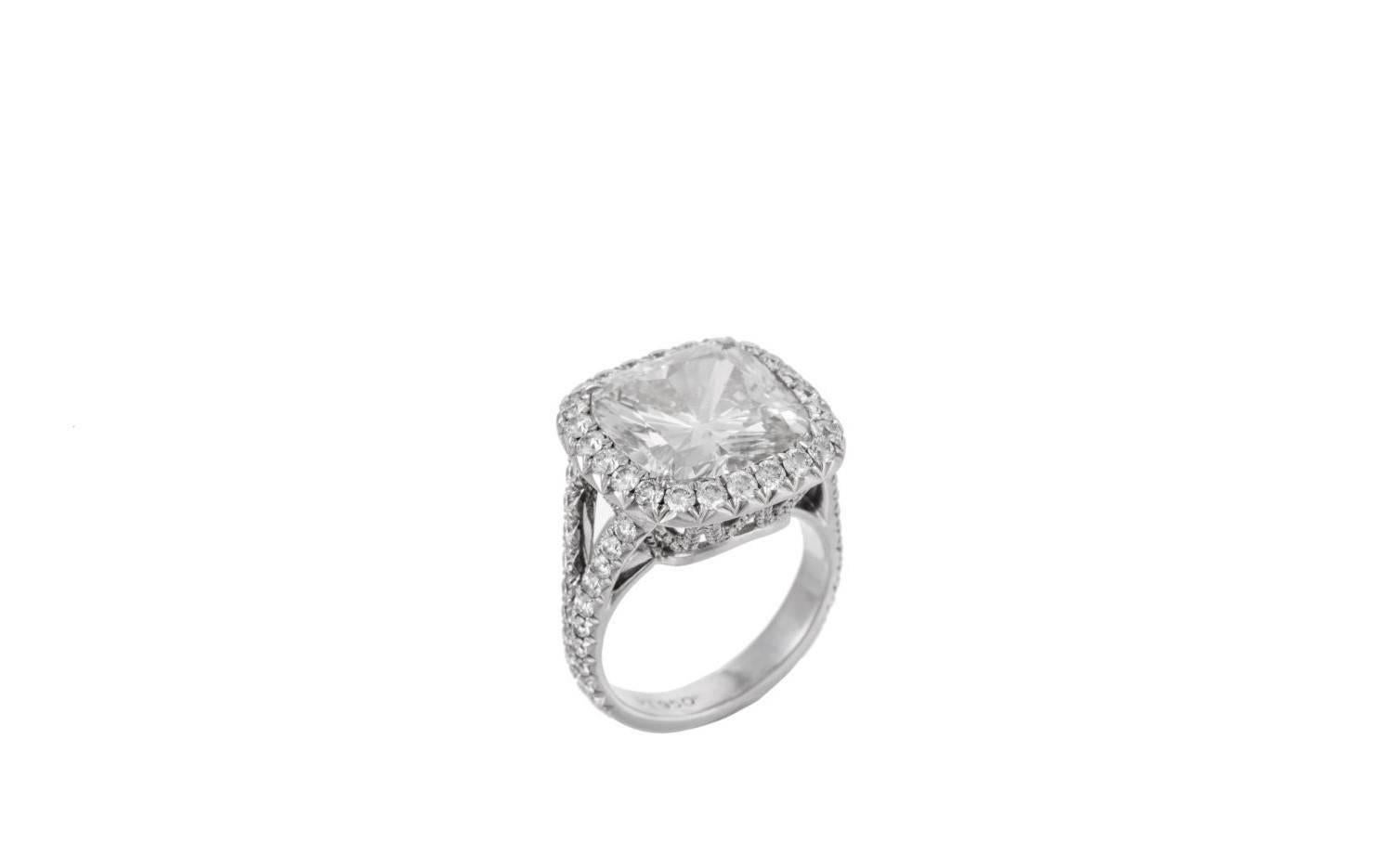 MAGNIFICENT RADIANT CUT DIAMOND RING. EXCLUSIVE WORKMANSHIP. 
THE CENTER STONE IS 8.03 J COLOR, VS2 IN CLARITY. GIA CERTIFIED.
SURROUNDED BY 2.50 CT. MICROPAVE DIAMOND HALO