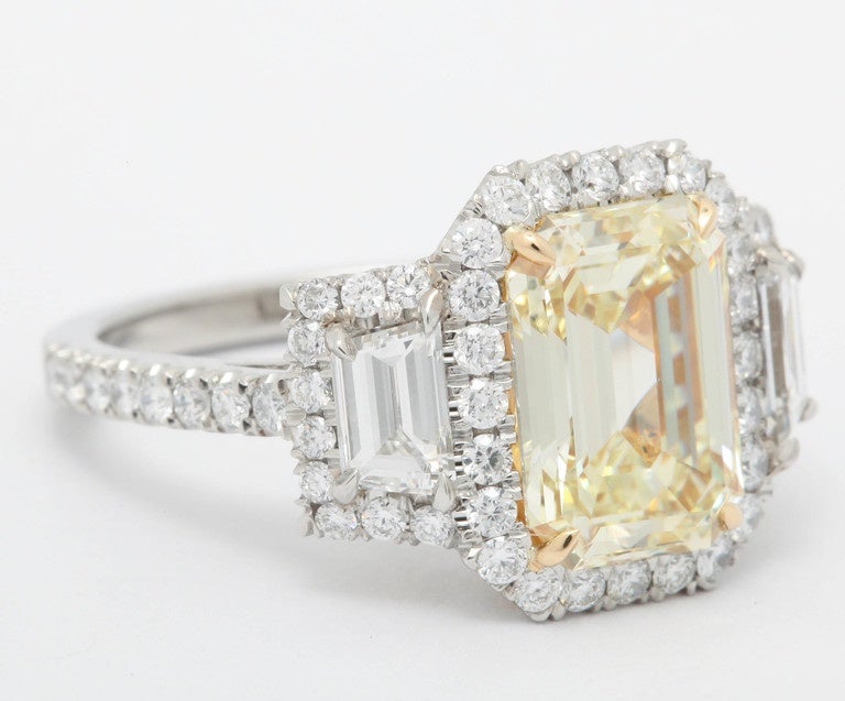 Modern 3.36 Carat Fancy Yellow Diamond Platinum Ring For Sale