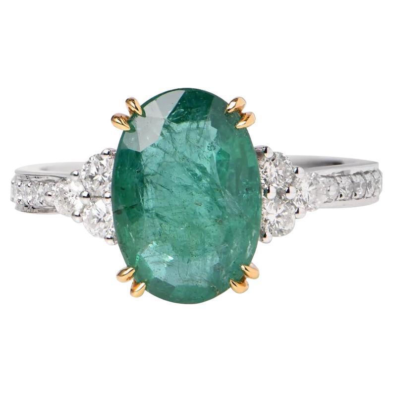 Emerald and Diamond Ring in 18ct White Gold