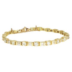 Bracciale tennis in oro giallo con diamanti rotondi e a baguette alternati, certificato GIA