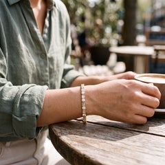 Bracciale tennis in oro giallo con diamanti rotondi e a baguette alternati, certificato GIA