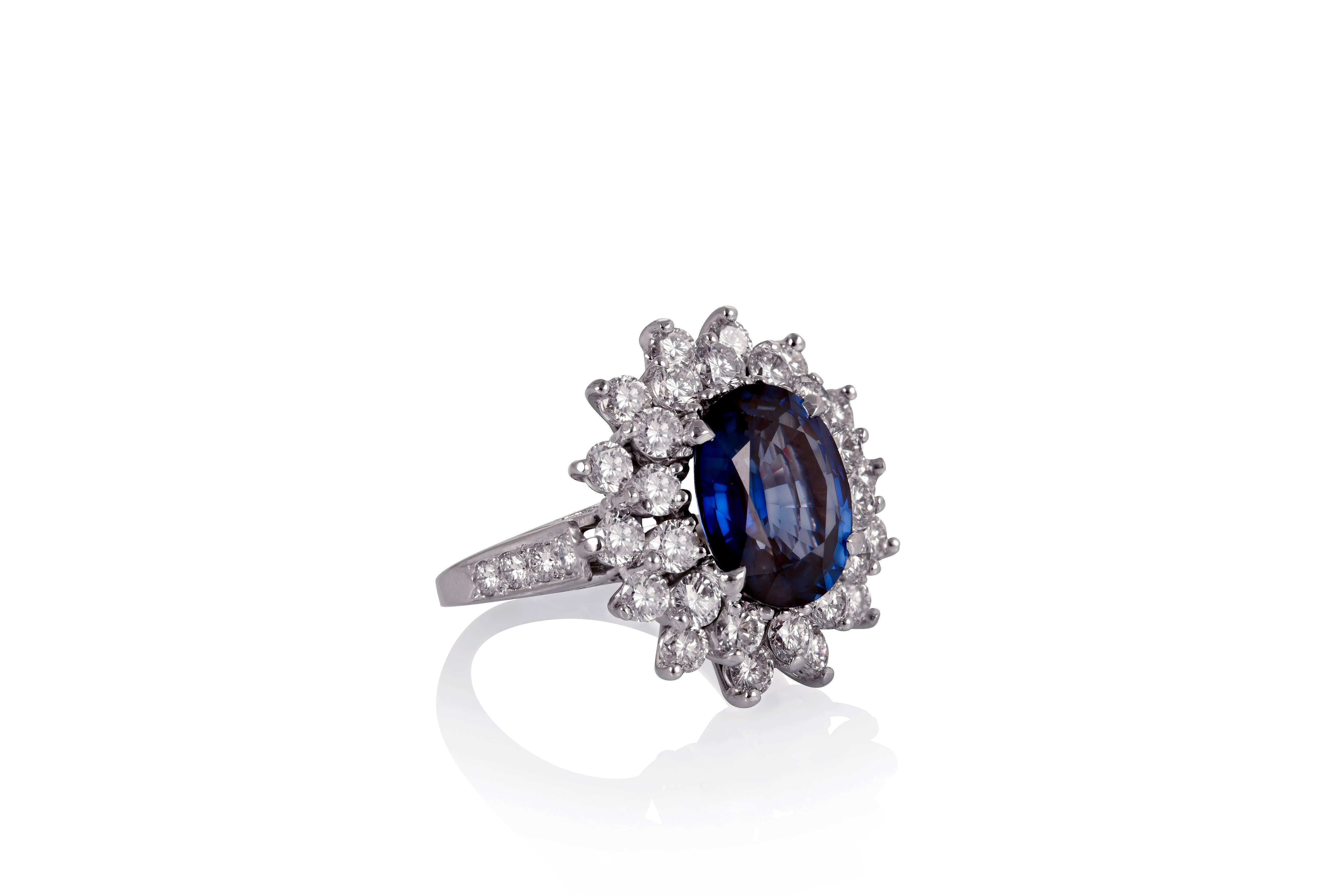 Boasting a beautiful step-cut oval sapphire weighing 6.95 carats, this ring is enhanced by a cluster of round brilliant diamonds, weighing an estimated 3.35 carats.
Ring size: 6 3⁄4