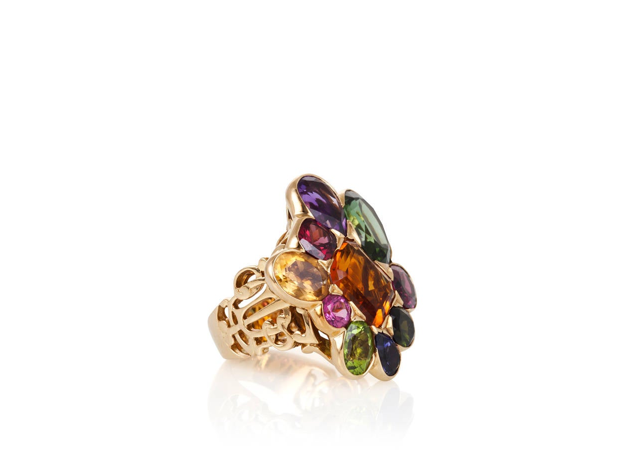 Designed as an asymmetrical cluster of gemstones, this bold and chic ring is at once playful and timeless in its appeal.

- French makers mark