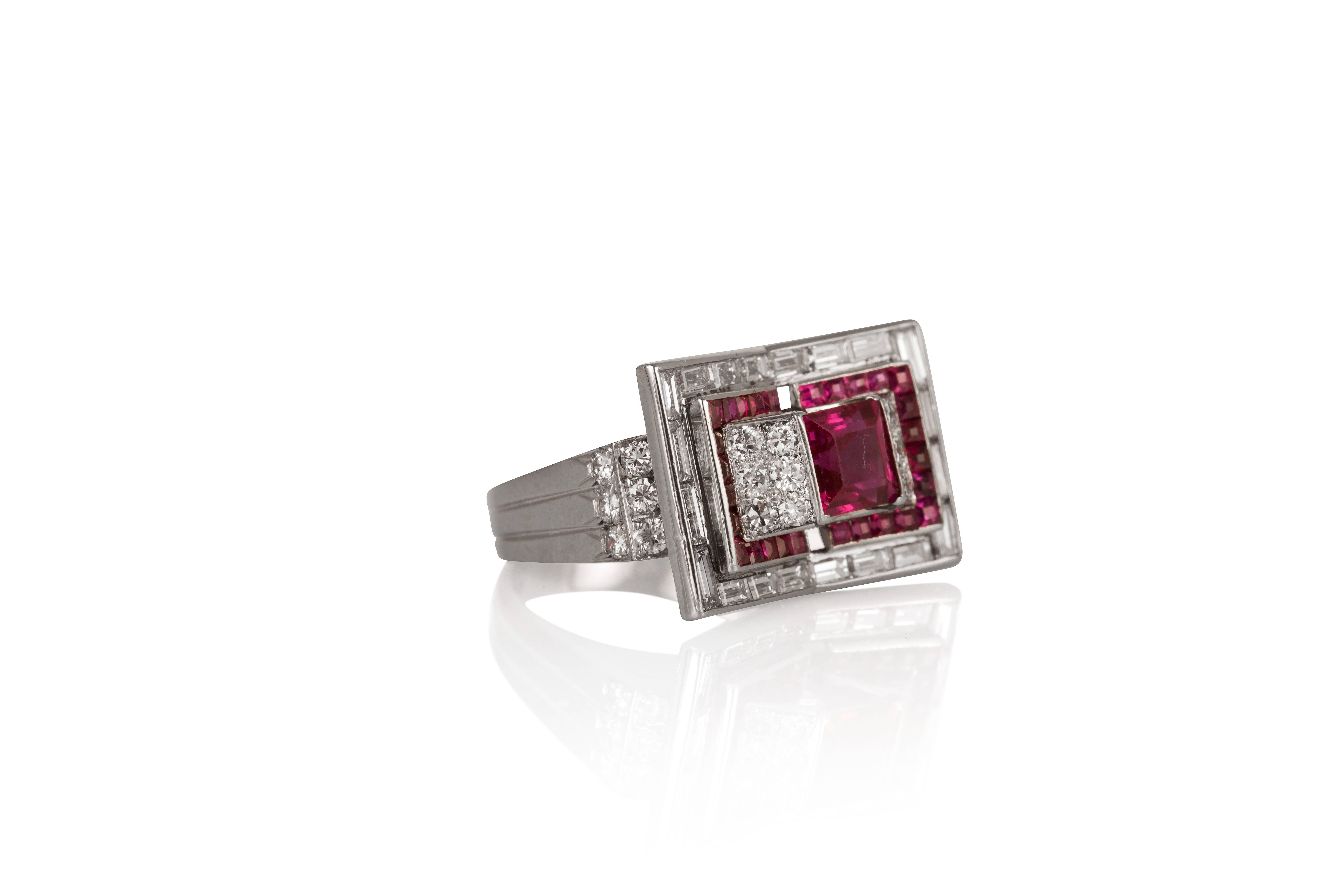 Centered on a square ruby weighing an estimated 1.20 carats, this geometric design ring also incorporates baguette and round diamonds and calibré cut rubies, mounted in platinum
Ring Size: 6

CREDENTIALS
•	American Gemological Laboratories
