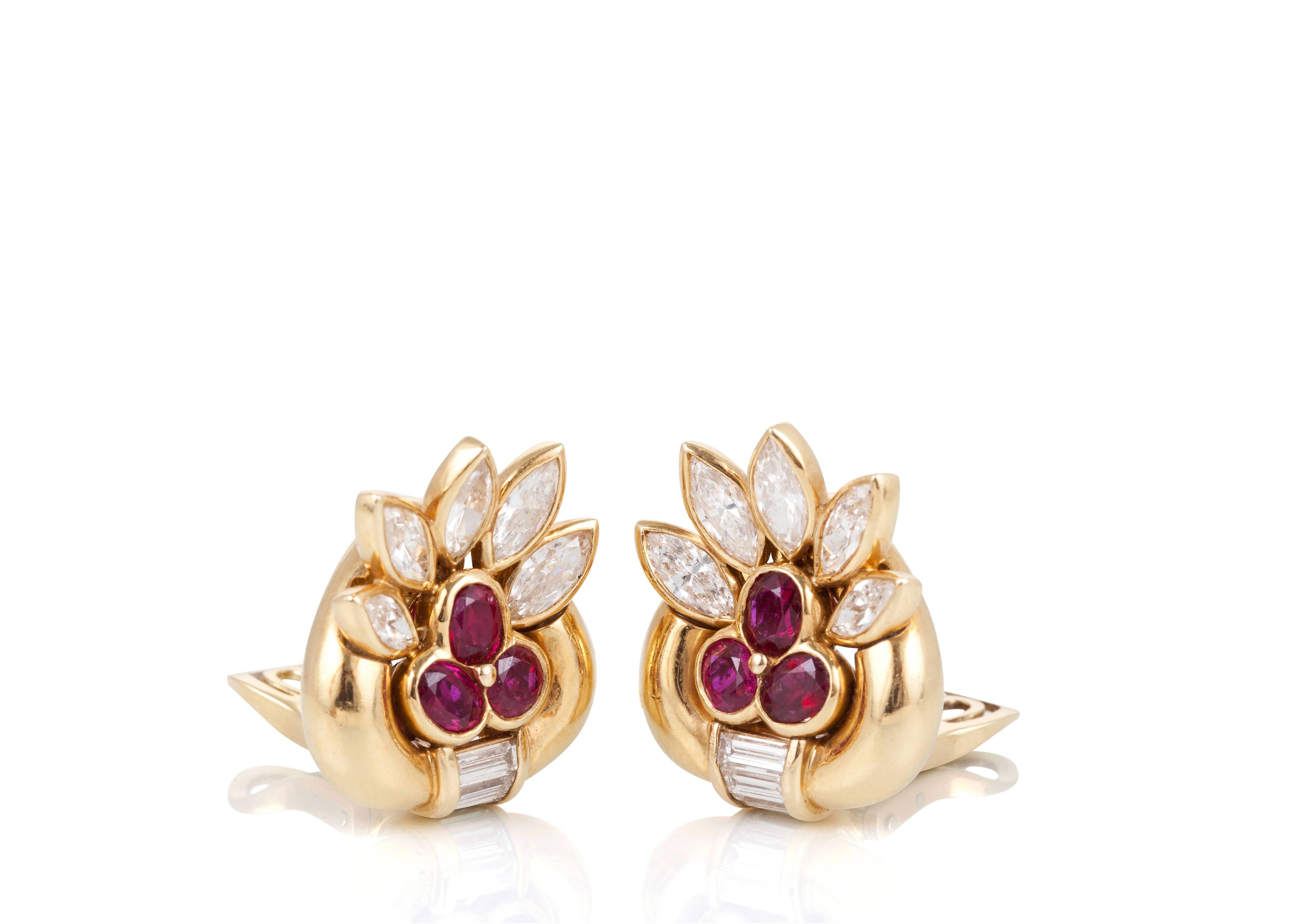 These elegant earclips feature six rubies weighing an estimated 3-4 carats and marquise and baguette diamonds, mounted in 18 karat yellow gold.