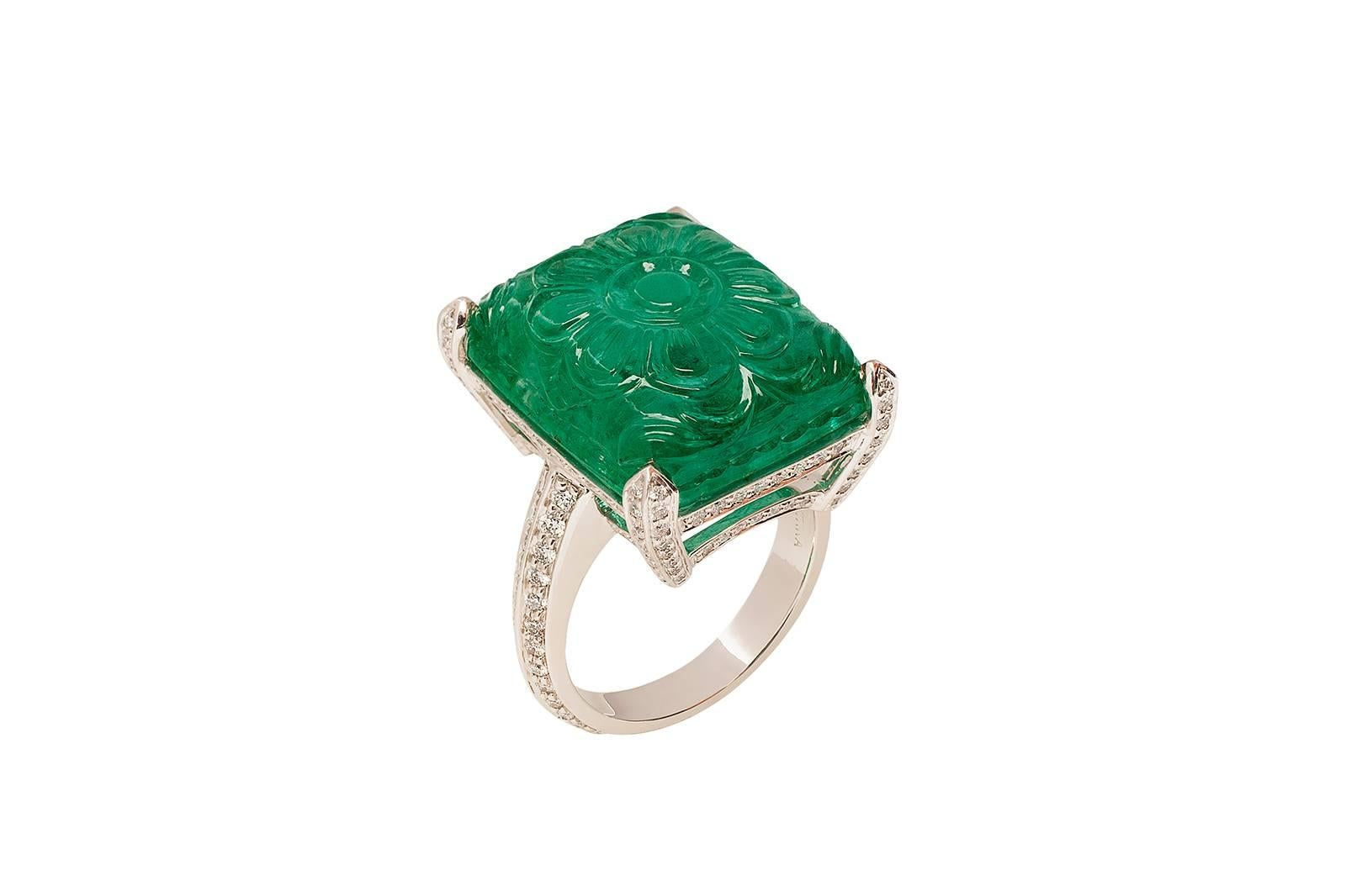 Carved Emerald Ring with Diamonds in Platinum. 19x15mm
Wt EM-23.22 cts, Dia-1.02 cts