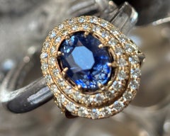 Bague en or 18 carats avec saphir naturel de Ceylan de 7,20 carats et halo de diamants, certifiée GIA