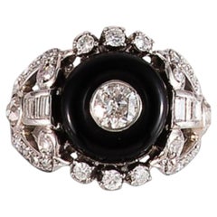 Art Deco Platinum Ring with 0.45ct Diamond and Onyx, Circa 1940