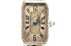 Elgin 14-Karat-Damenarmbanduhr aus den 1920er Jahren, neuwertiger Zustand, mit Blumengravur und Saphir im französischen Schliff