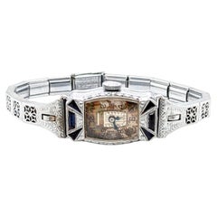 Vintage-Damenarmbanduhr von Bulova aus 14-karätigem Gold, 1920er Jahre, mit graviertem Saphir im French-Cut im Art-Déco-Stil