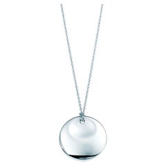 Collier Tiffany & Co avec pendentif rond en argent sterling, création d'Elsa Peretti