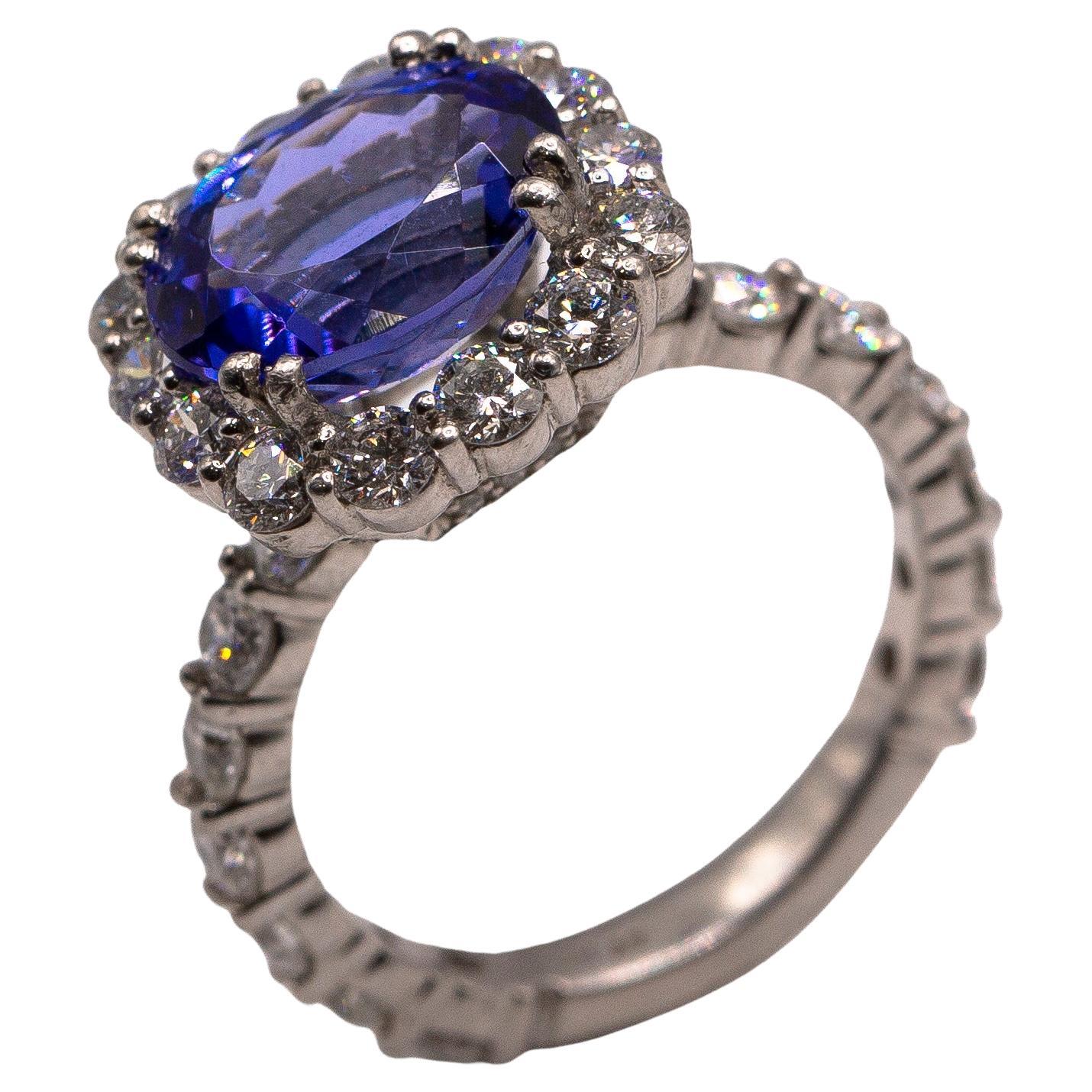 7.80 carats total Ceylon oval sapphire and diamond 950 Platinum Diamond Ring For Sale