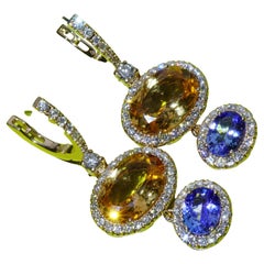 Stunningly beautiful Earrings apricot-colored Garnet and Tanzanite 18 kt Gold