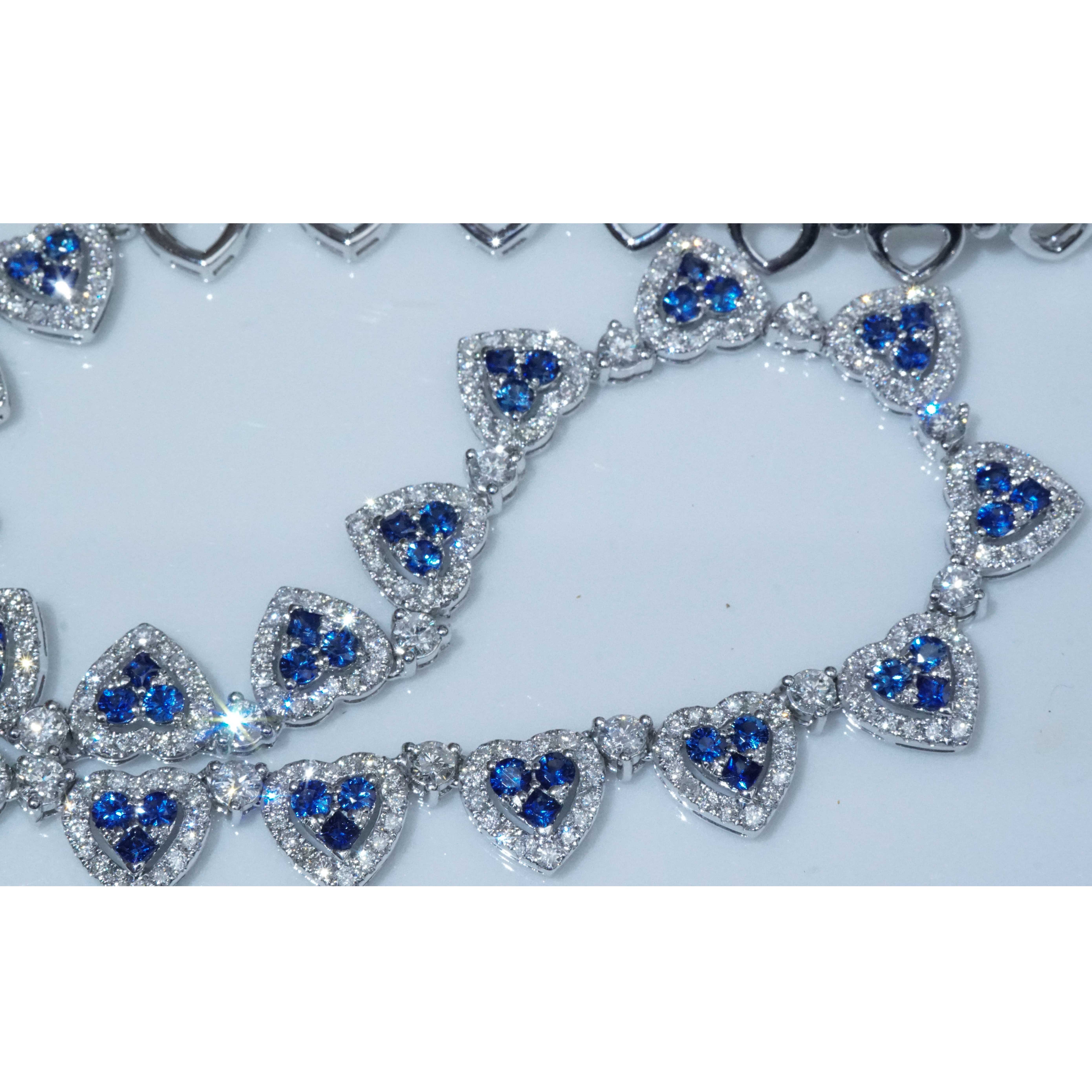 immortalized love of the heart fully movable brilliant sapphire necklace consisting of 19 heart elements set with 322 full-cut brilliant-cut diamonds totaling approx. 4.40 ct, W (white) / SI1-2 (very small inclusions) and 57 fine sapphires totaling