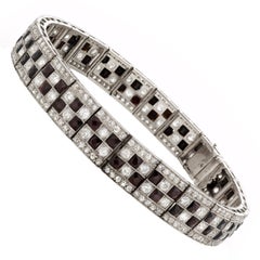 Bracelet ligne art déco en platine, onyx et diamants en damier