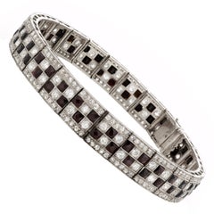 Bracelet ligne art déco en platine, onyx et diamants en forme de damier