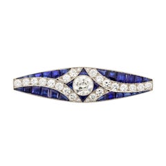 Antique Art Deco Platinum Calibré-Cut Sapphire and Diamond Bar Pin