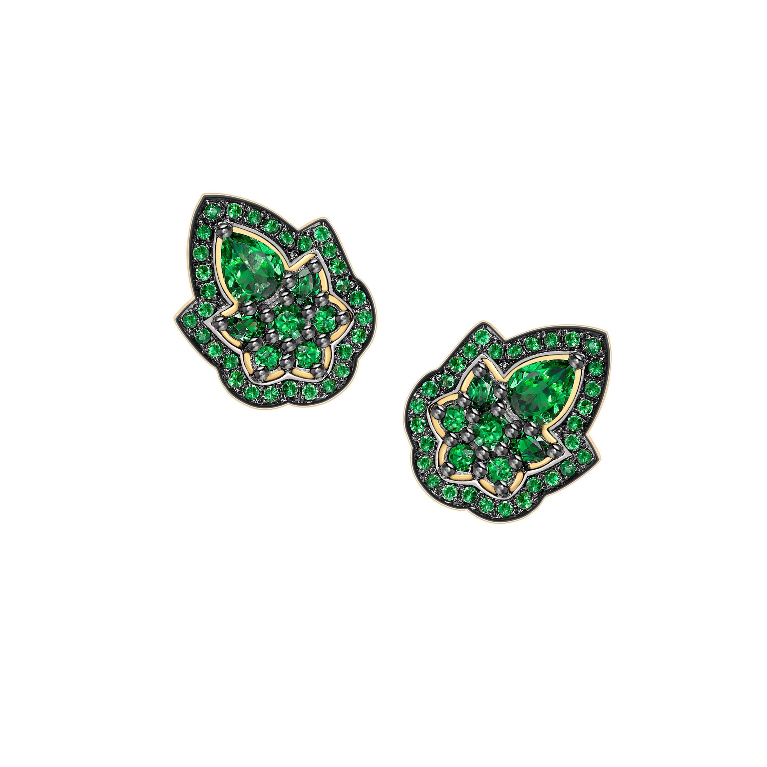 These studs have been handcrafted in London using 18ct yellow gold and are set with 2.40ct of vivid green natural tsavorites. The top of the earrings have a black rhodium finish to contrast with the yellow gold and the vivid green tsavorites.

width