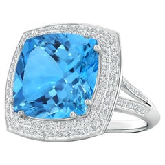 ANGARA Anillo de Topacio Azul Suizo Certificado GIA en Oro Blanco con Aureola de Diamantes