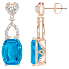 Angara Natural Barrel-Shaped 7 ct Swiss Blue Topaz Dangle Earrings in 14K Gold