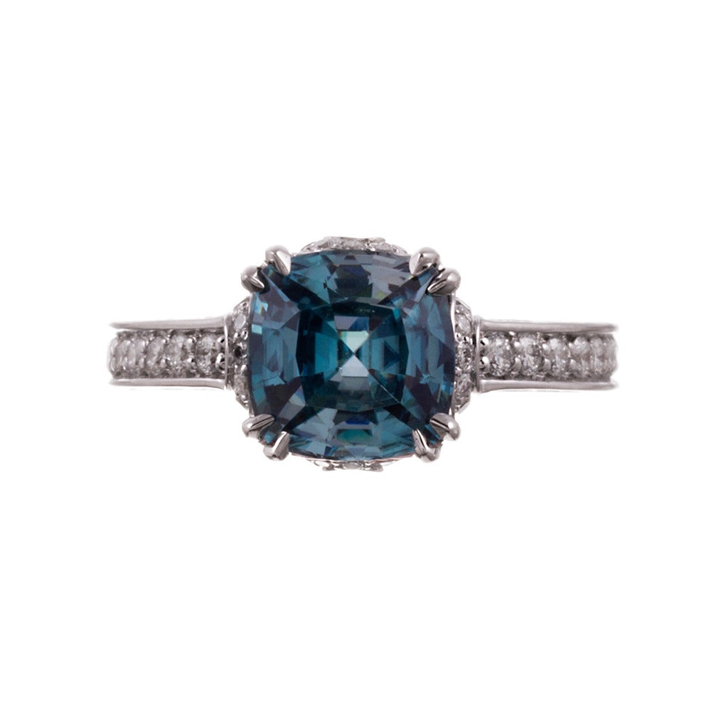 For she who seeks something distinctive and different, we offer a classically-styled ring set in the center with a 3.54 carat blue zircon. This gemstone is frequently under-appreciated and largely unknown, but it has a striking color that will be