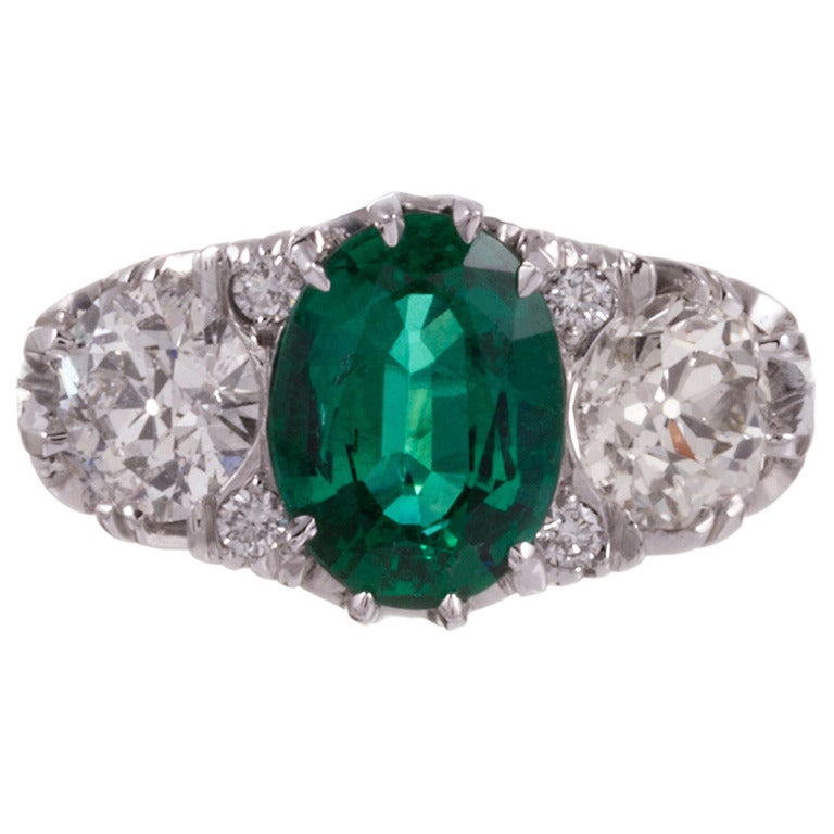 English Carved Style 2.25 Carat Emerald and Diamond Ring