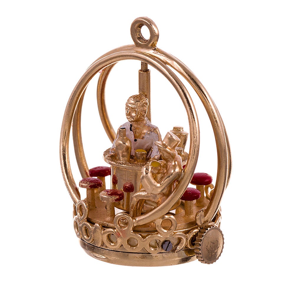 Made of 14k yellow gold and enamel, this “living charm” is part of a series created by American Jeweler Dankner in the 1960s. Fitted with a watch movement, you can wind the crown and watch the charm come to life. Indeed, a truly charming piece that