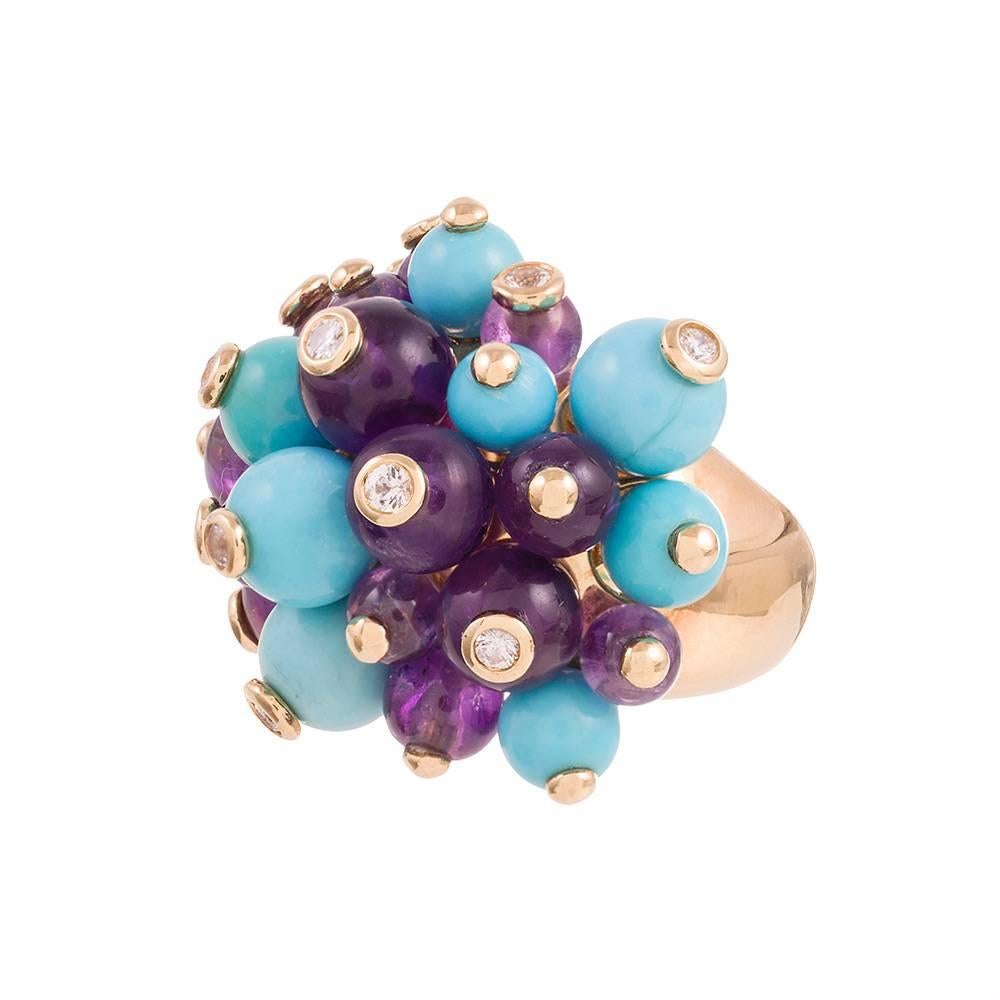 This dome ring is fun, bold and playful. Combining beads of amethyst and turquoise, each topped with a bezel set white diamond. Sit back and enjoy the compliments. 18k yellow gold. Size 6.75 can be resized on request. 