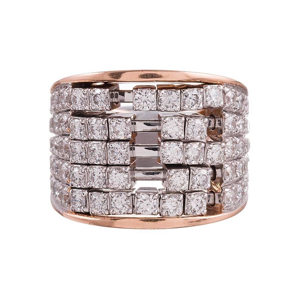 This is such a fun piece to wear, offering movement, bold style and inspired craftsmanship… it even makes a lovely sound when moved around! Designed as a band style ring that lays flat to the finger, tapering from 3/4 of an inch to 1/4 of an inch