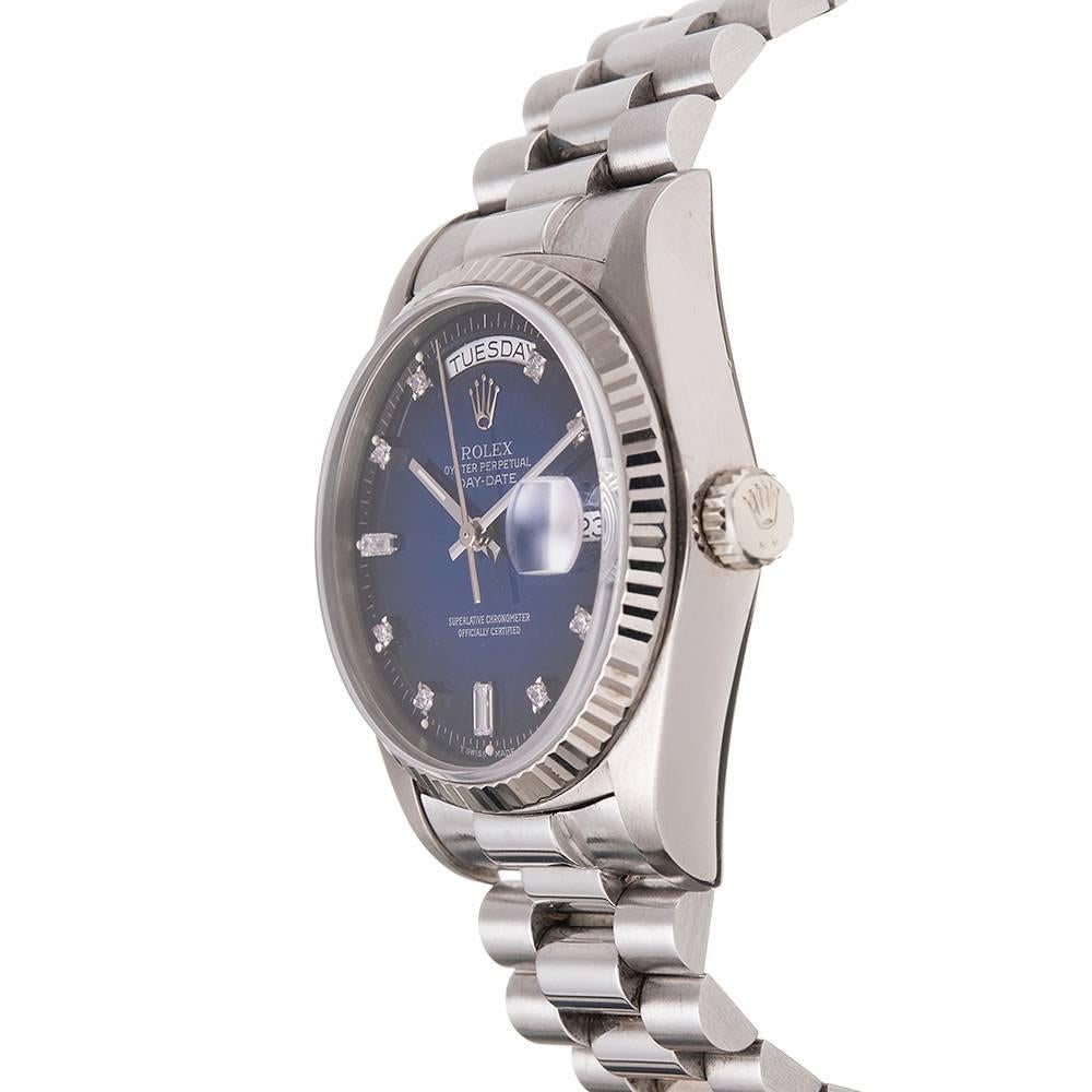 An uncommon example, even without the unique provenance, this Day-Date ref. #18039 is a beautiful watch for a lady or a gentleman. The blue vignette diamond dial- a variation now discontinued by Rolex- is a rarity in itself, particularly on a white