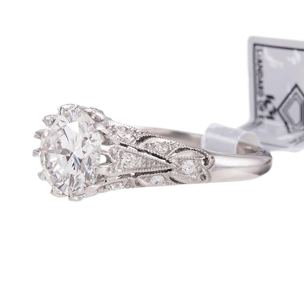 New

Made by hand in the classic art deco tradition, yet offering the physical integrity of a new piece of jewelry, this beautiful diamond solitaire ring offers loads of detail while maintaining a timeless design you will love forever. Look