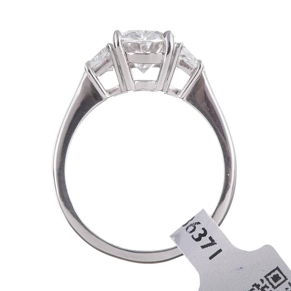 oval engagement ring with trapezoid side stones