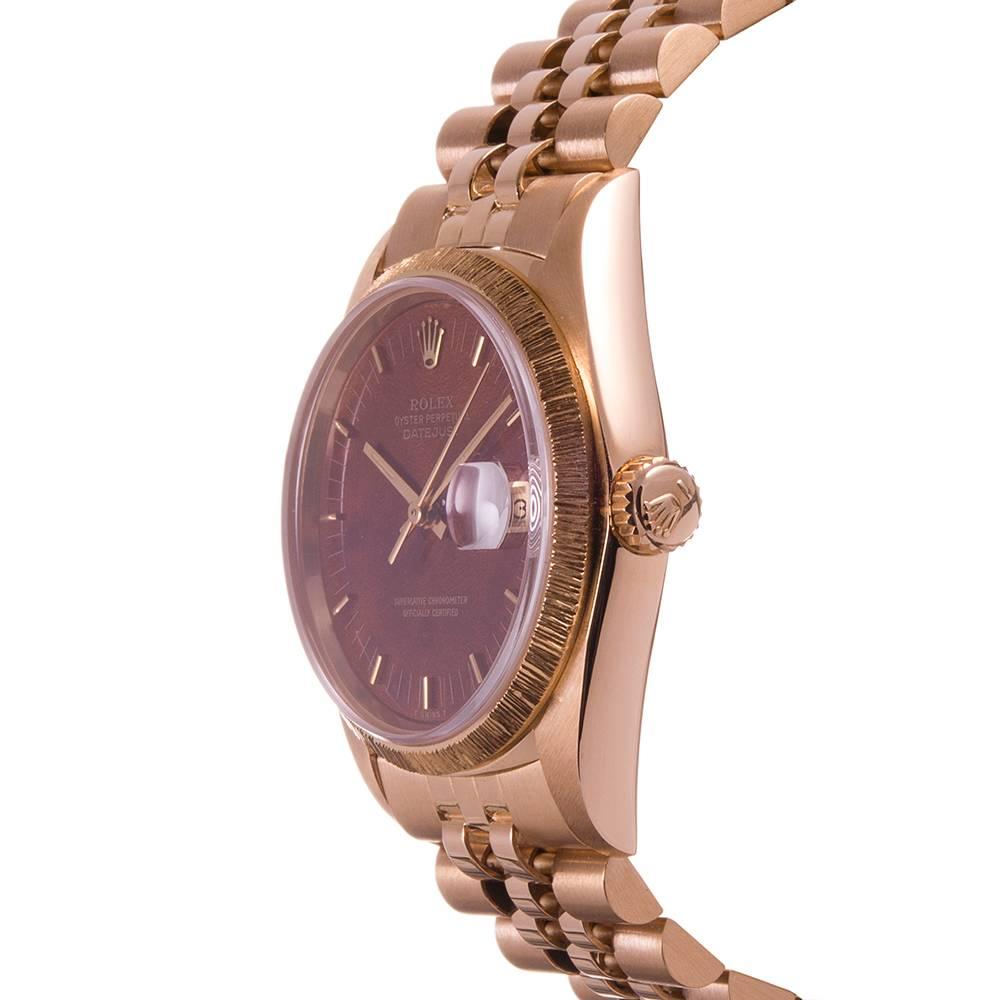 An unusual and beautiful combination of details make this a rather rare vintage find. The watch is a ref. #16078 Datejust in 18k yellow gold, made circa 1978. This would have been among the first Datejusts offered by Rolex with a sapphire crystal.